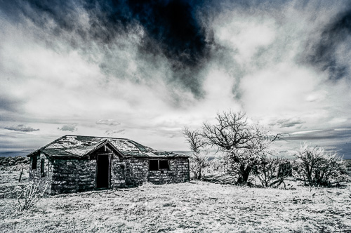 abandoned adobe house